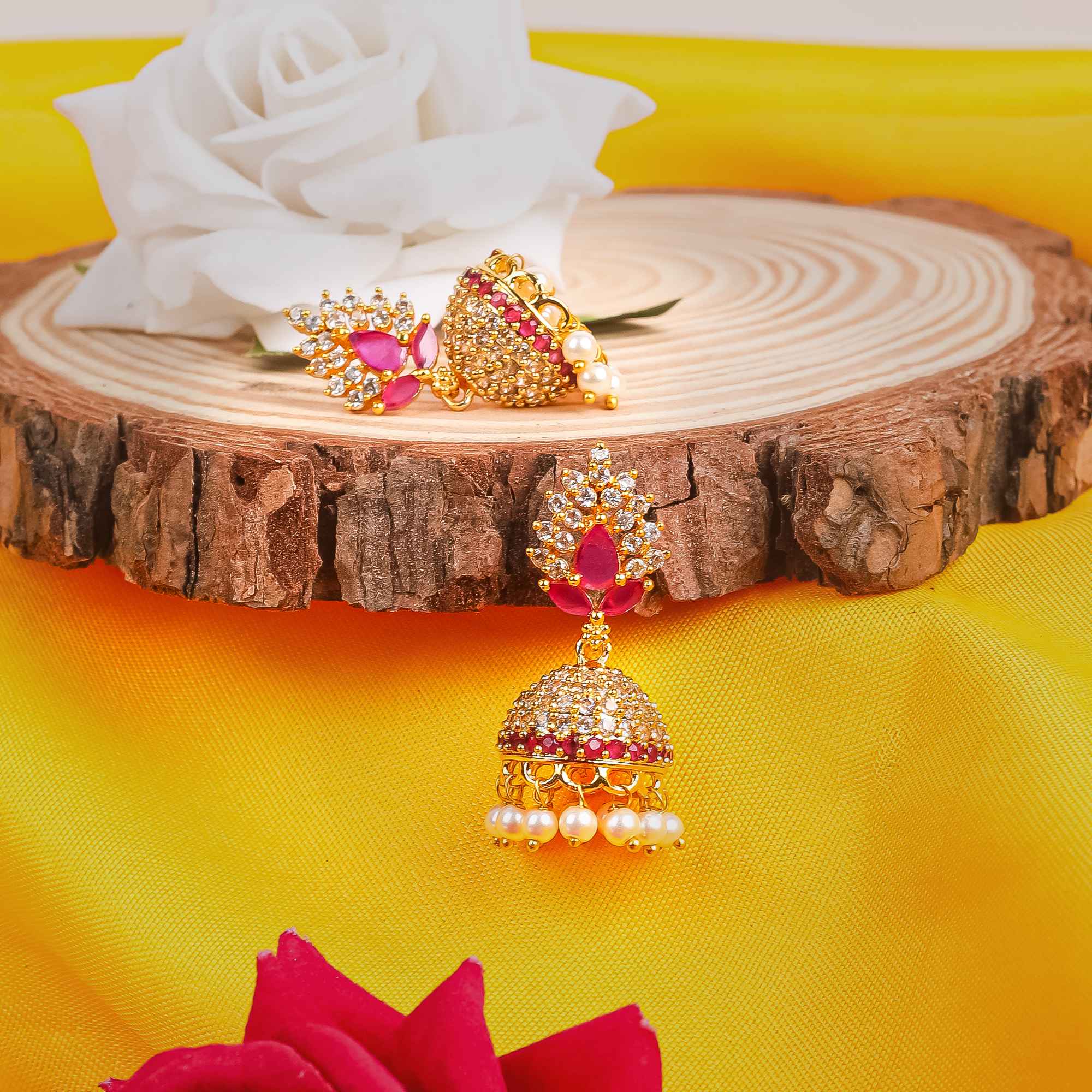 Gold Plated Pink Stone Jhumka Earrings with Pearls – Festive & Bridal Jewelry