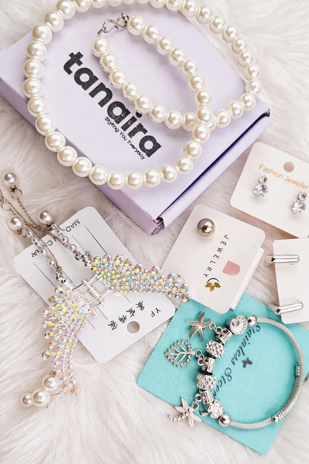 Jewellery gift hamper set with pearl necklace bracelet charm bracelet and AD studded earrings for women