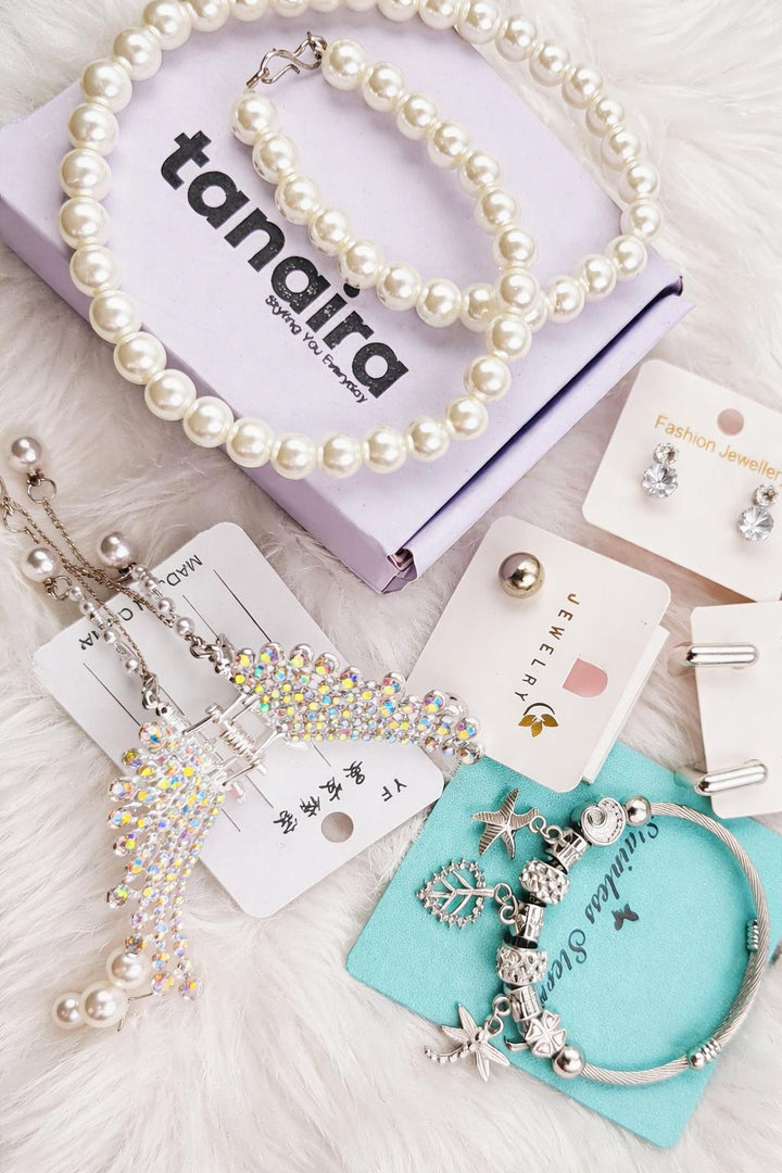 Jewellery gift hamper set with pearl necklace bracelet charm bracelet and AD studded earrings for women