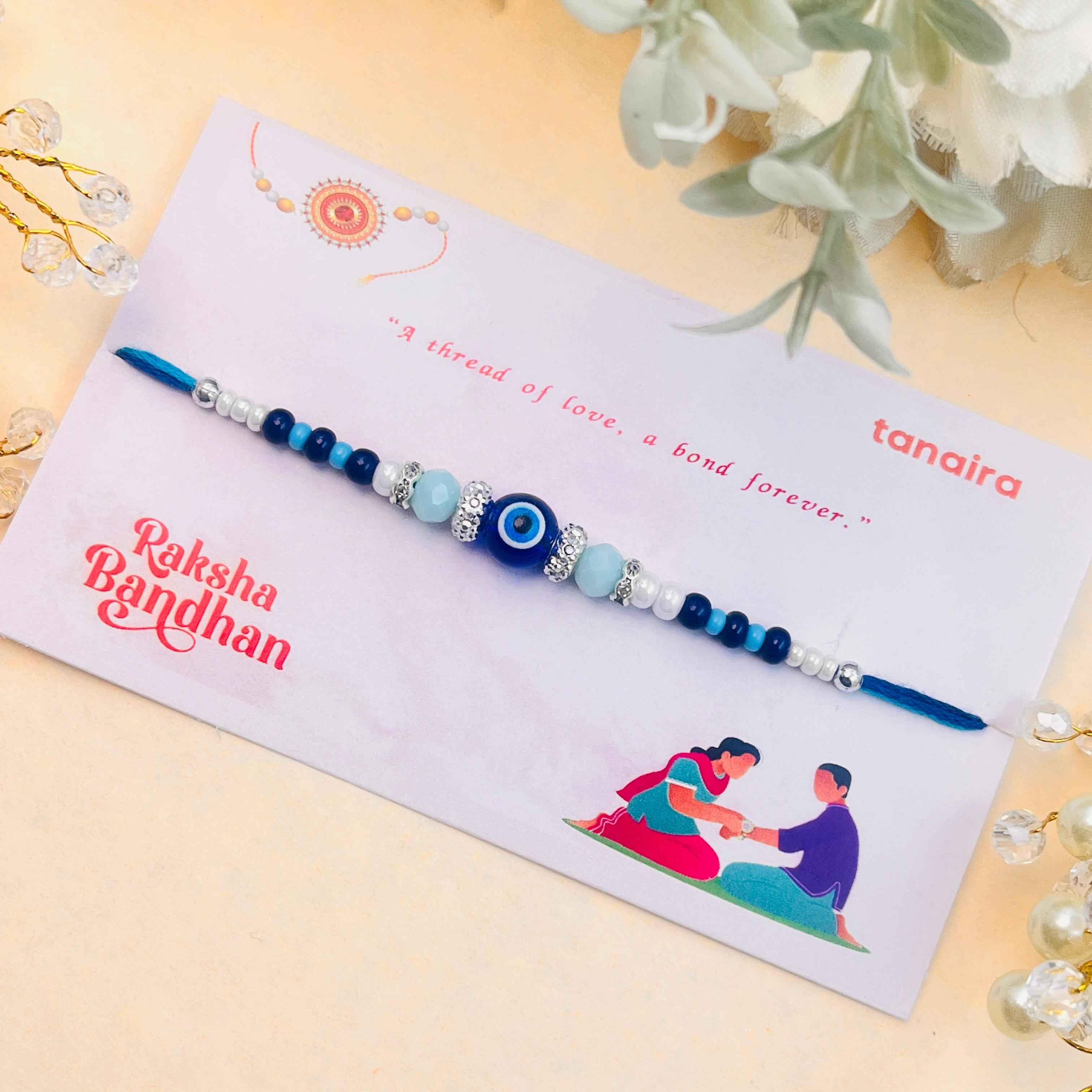 Blue Evil Eye Rakhi with Crystal Rings