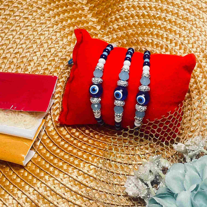 3 Pcs Evil Eye Rakhi Set with Roli, Chawal & Tikka | Blue Beaded Designer Rakhi for Brothers