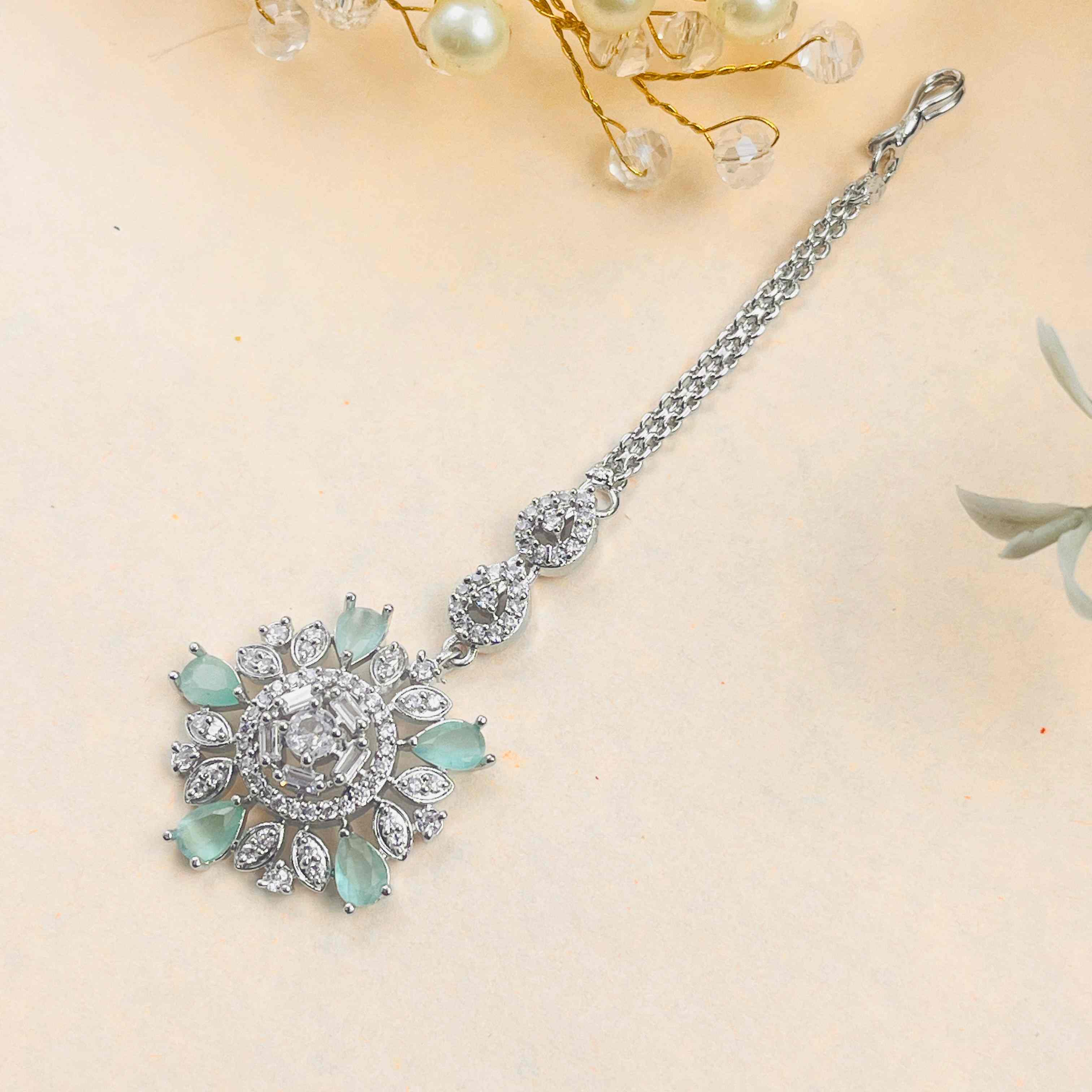 Tanaira Mint Green American Diamond Maangtikka