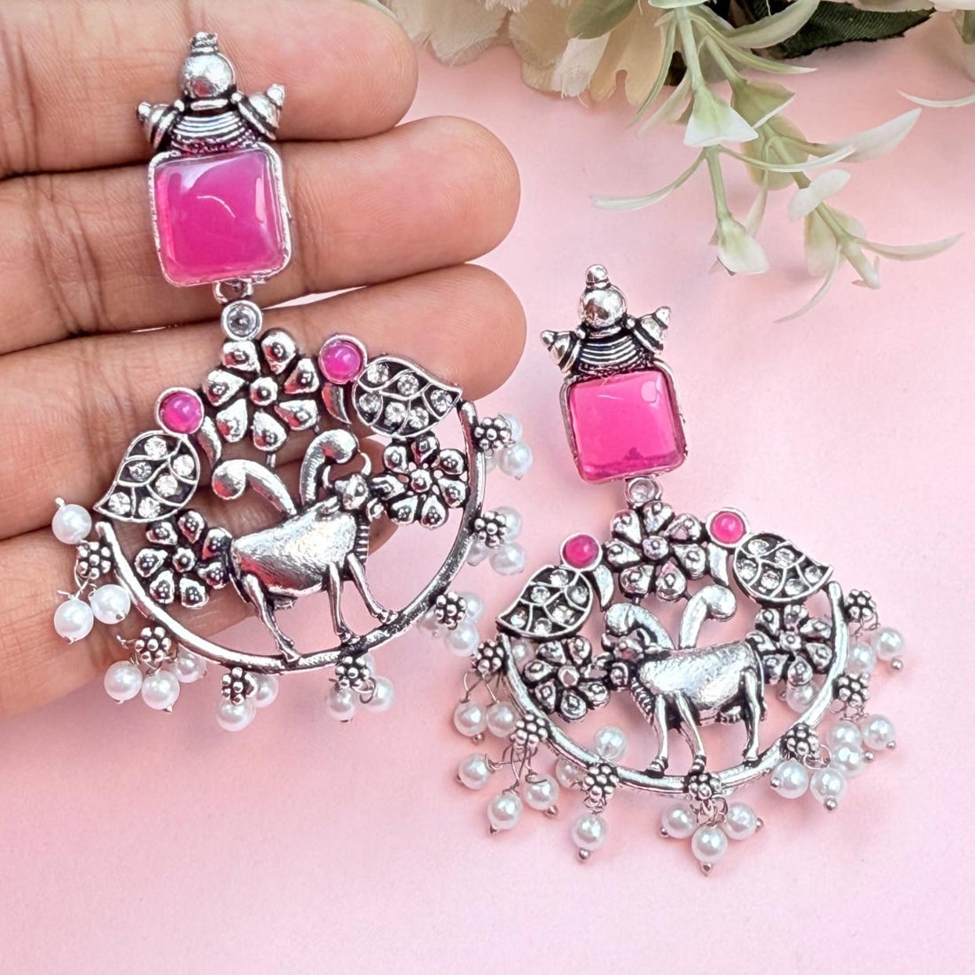 Ethnic deer design earrings with pink stone top and pearl cluster drop