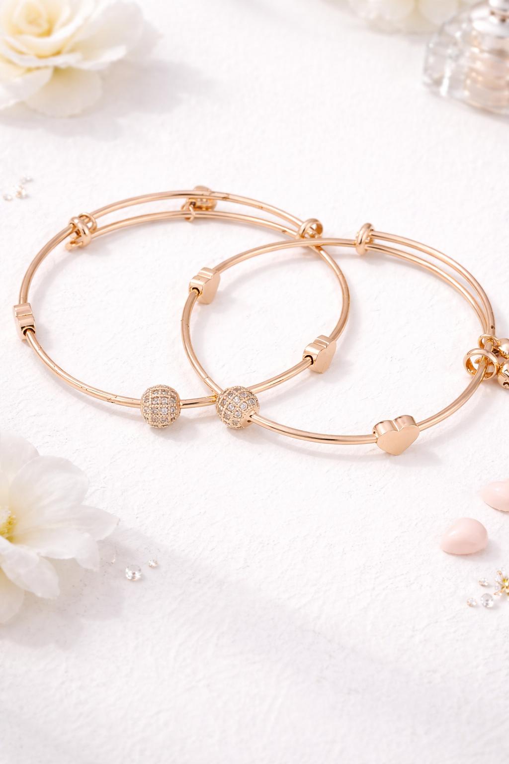 Minimal rose gold bangle bracelet set with heart charm and crystal ball design