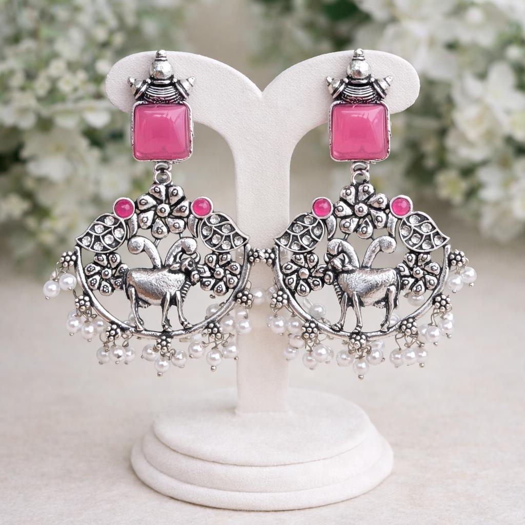 Oxidised silver deer earrings with pink square stud and pearl hanging detail