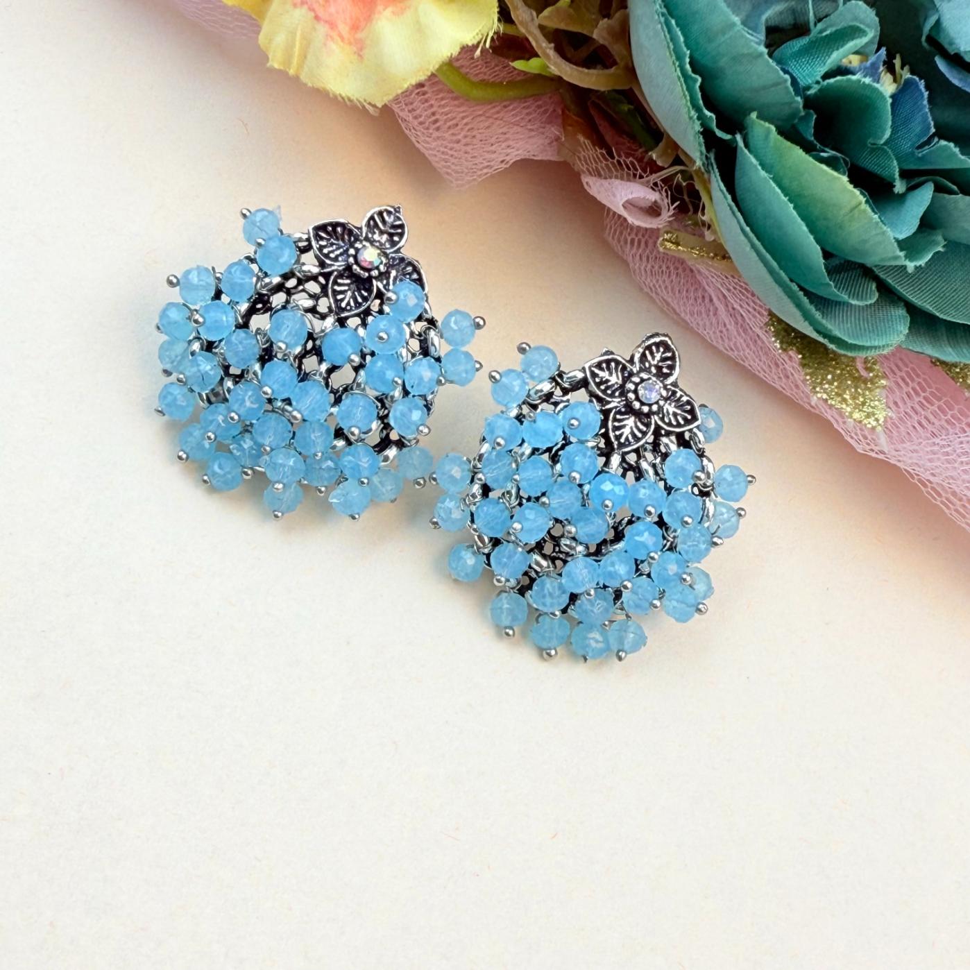 oxidised floral earrings with sky blue beads for women