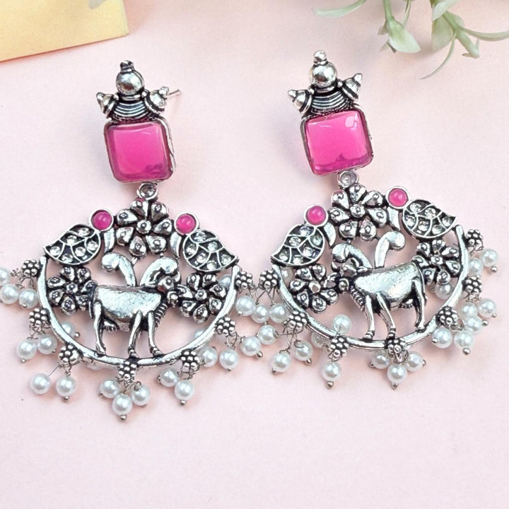 Pink stone oxidised deer motif earrings with pearl drops traditional design