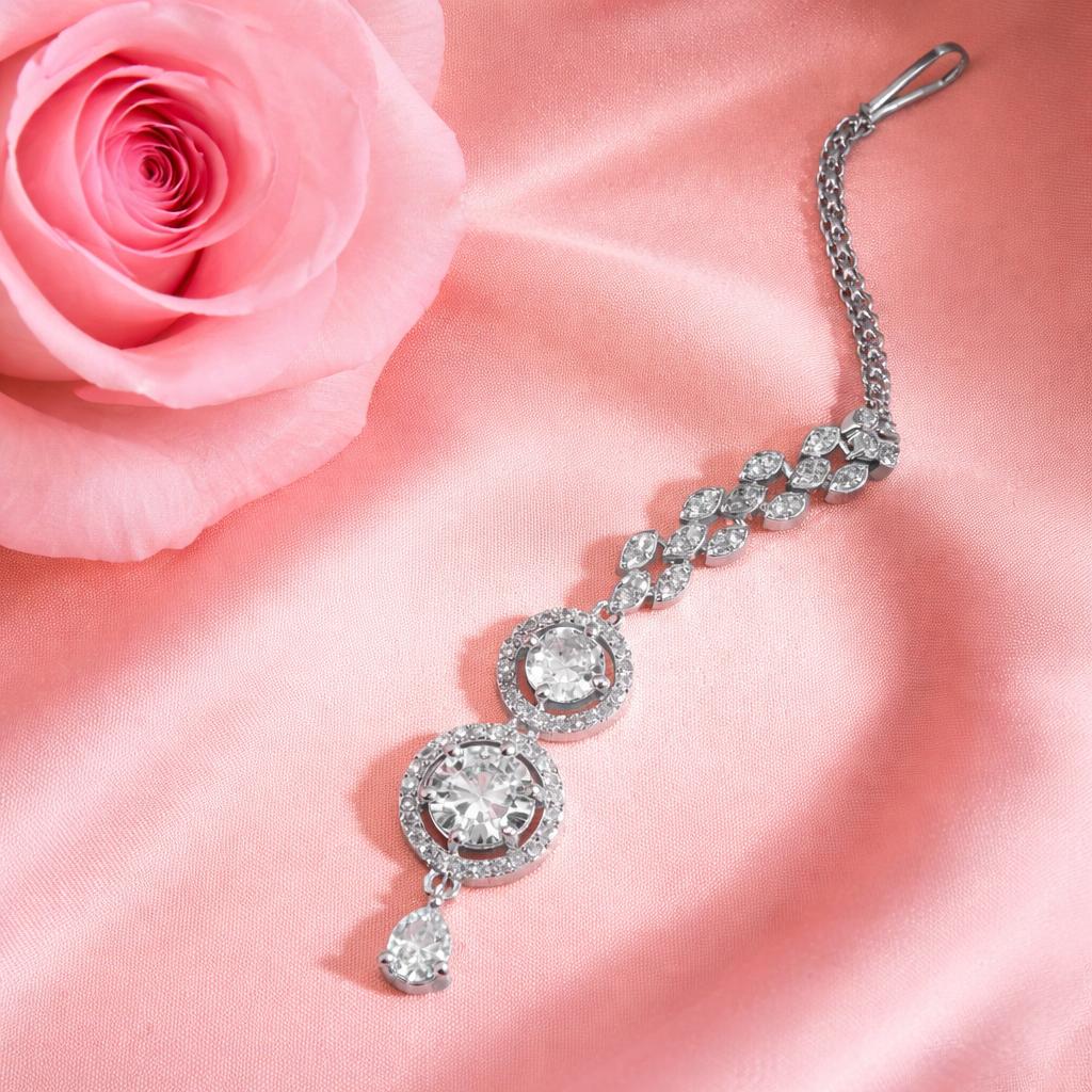 Stylish silver AD forehead tikka with sparkling stones for traditional occasions