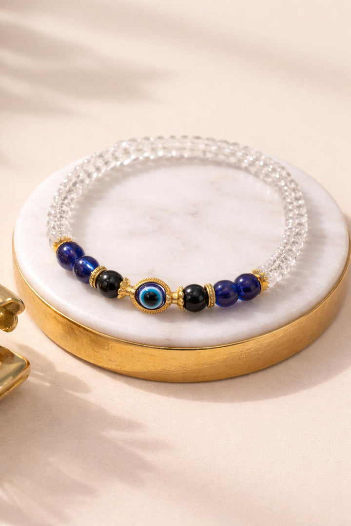 Protective evil eye bracelet with crystal beads and gold tone detailing