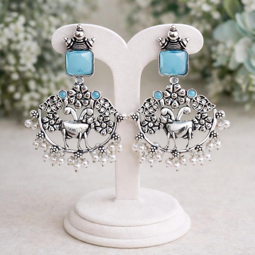Tribal oxidised earrings with animal design blue stone pearl hanging boho ethnic jewellery for women latest collection