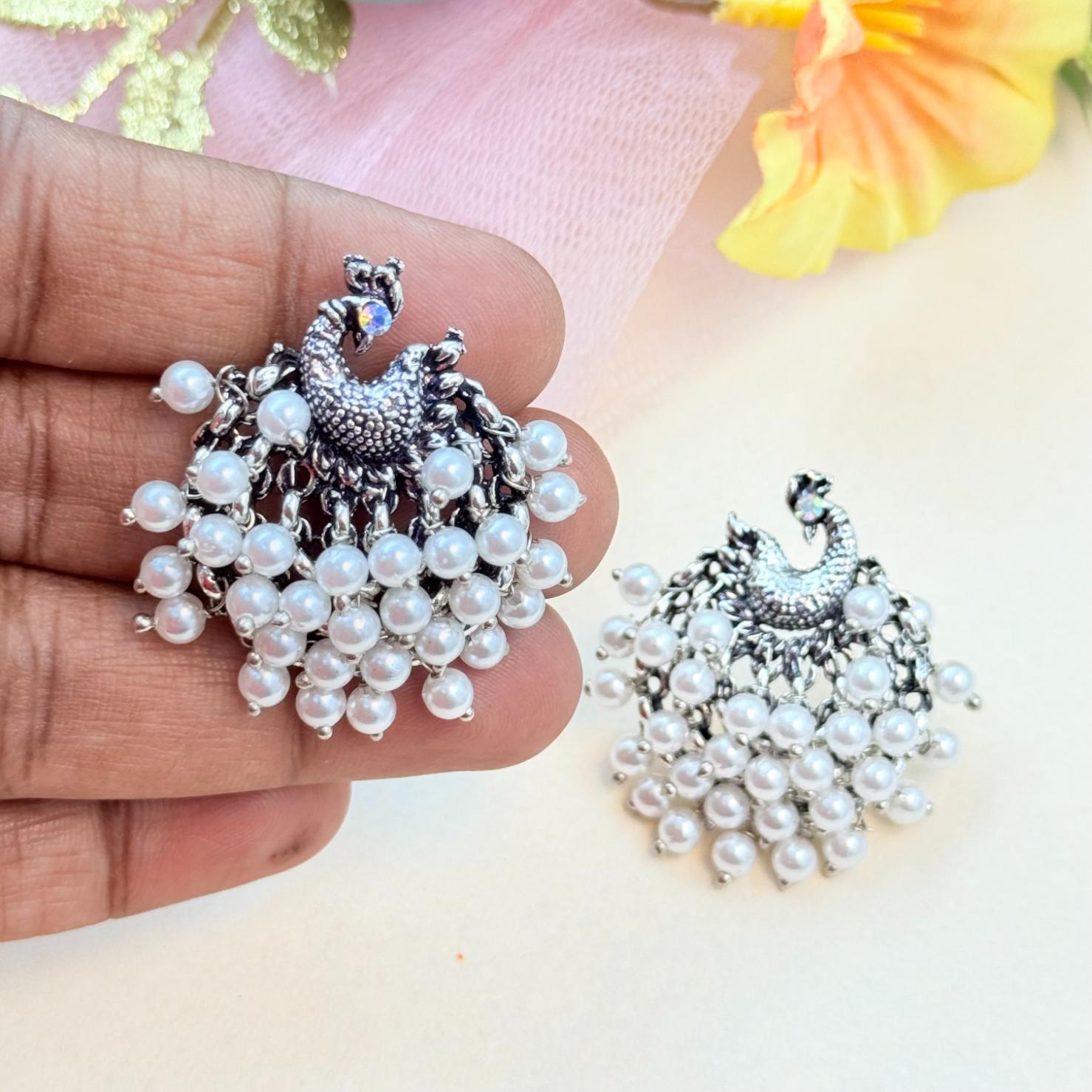 white pearl oxidised earrings traditional floral design