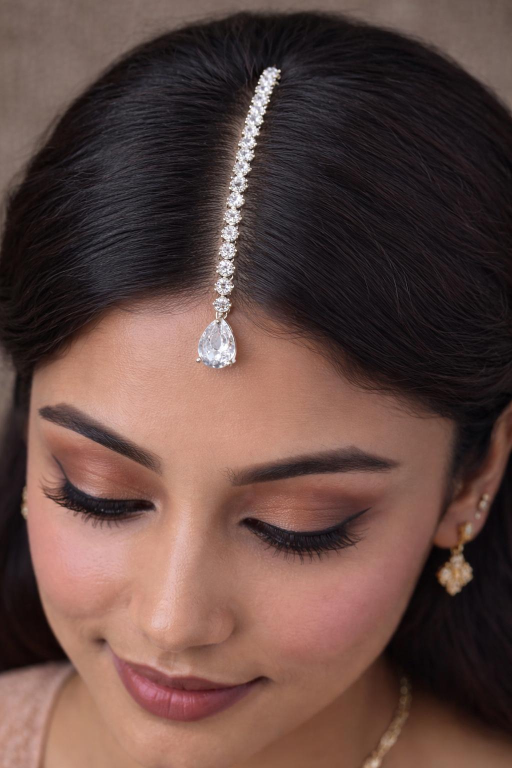 White stone chain maangtika with white teardrop pendant bridal forehead jewelry